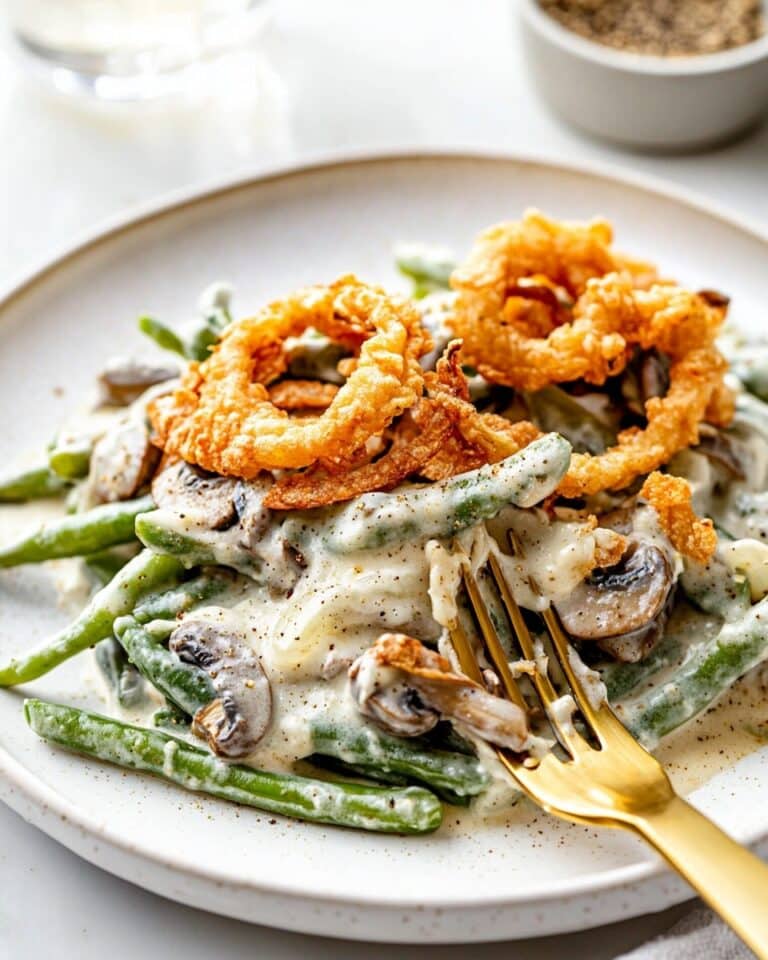 Creamy Green Bean Casserole with Mushrooms, Fried Onions, and Parmesan Recipe