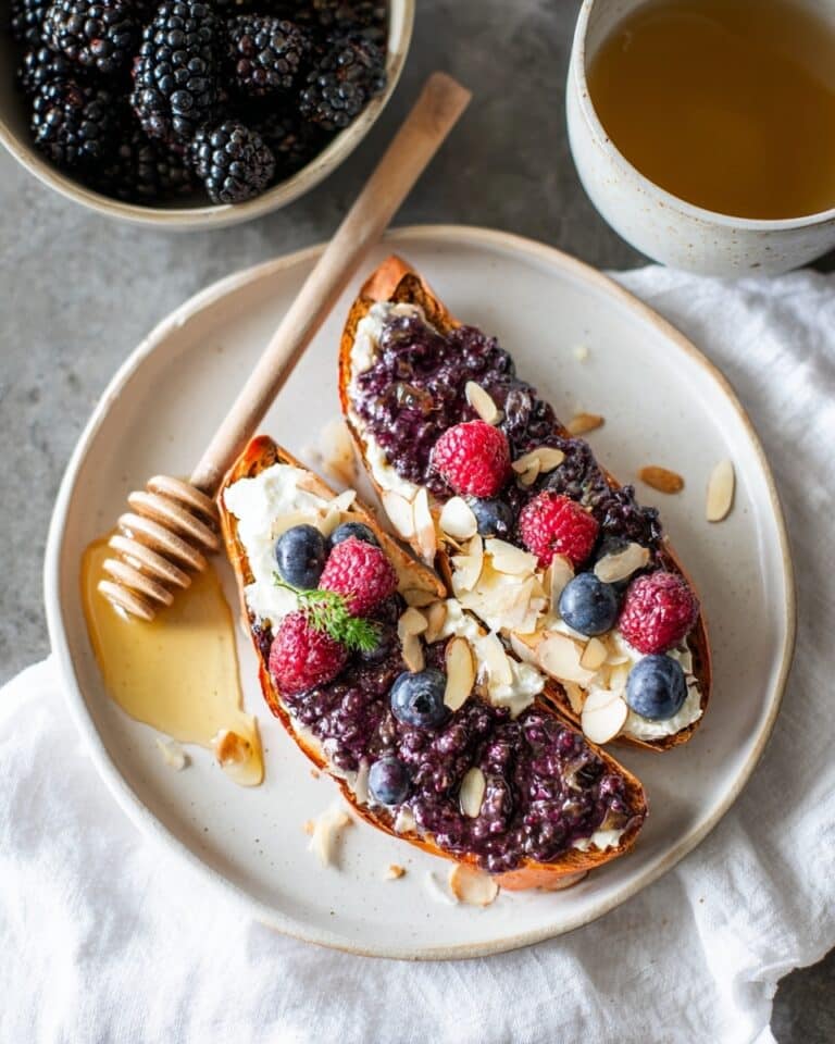 Sweet Potato Toast with Ricotta, Berries, Honey, and Almonds Recipe