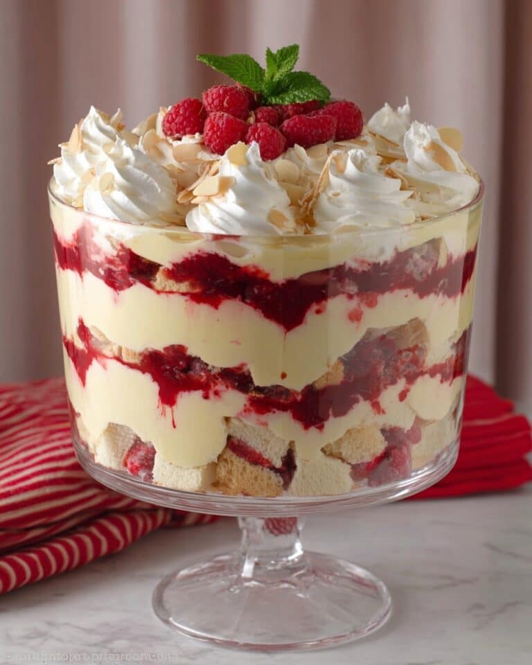 Christmas Trifle Delight with Pears, Raspberries, and Lush Creme Anglaise Recipe