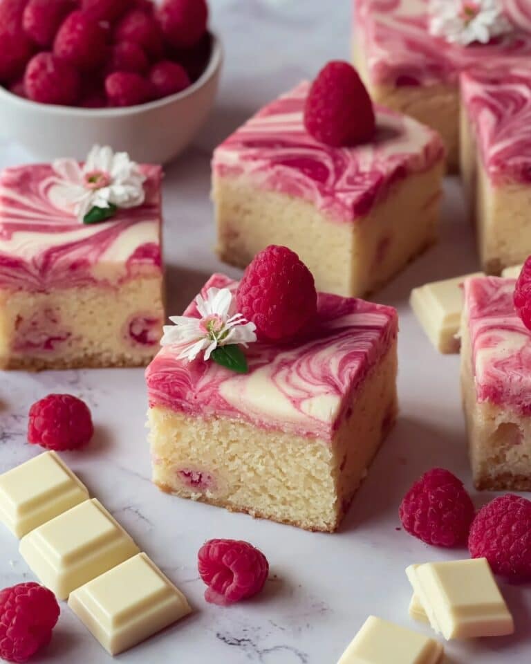 White Chocolate Raspberry Cake with Raspberry Jam and Cream Cheese Frosting Recipe