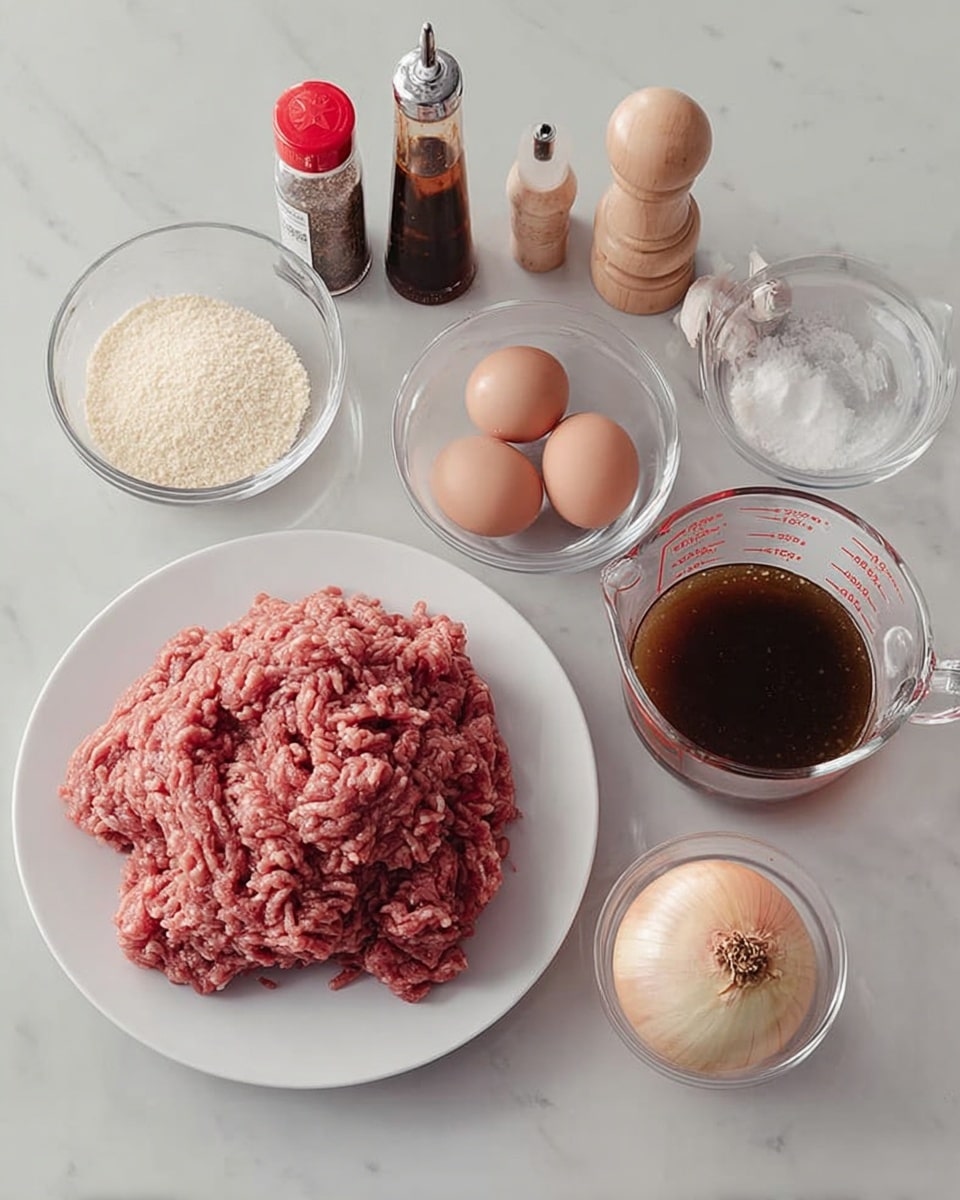 The image shows four brown, cooked patties covered with a thick layer of golden-brown onion gravy with translucent, soft onion slices scattered on top and around. The patties have a textured, slightly crispy surface visible beneath the gravy. Everything is inside a round white pot. The pot sits on a white marbled surface, highlighting the rich, warm tones of the dish. photo taken with an iphone --ar 4:5 --v 7