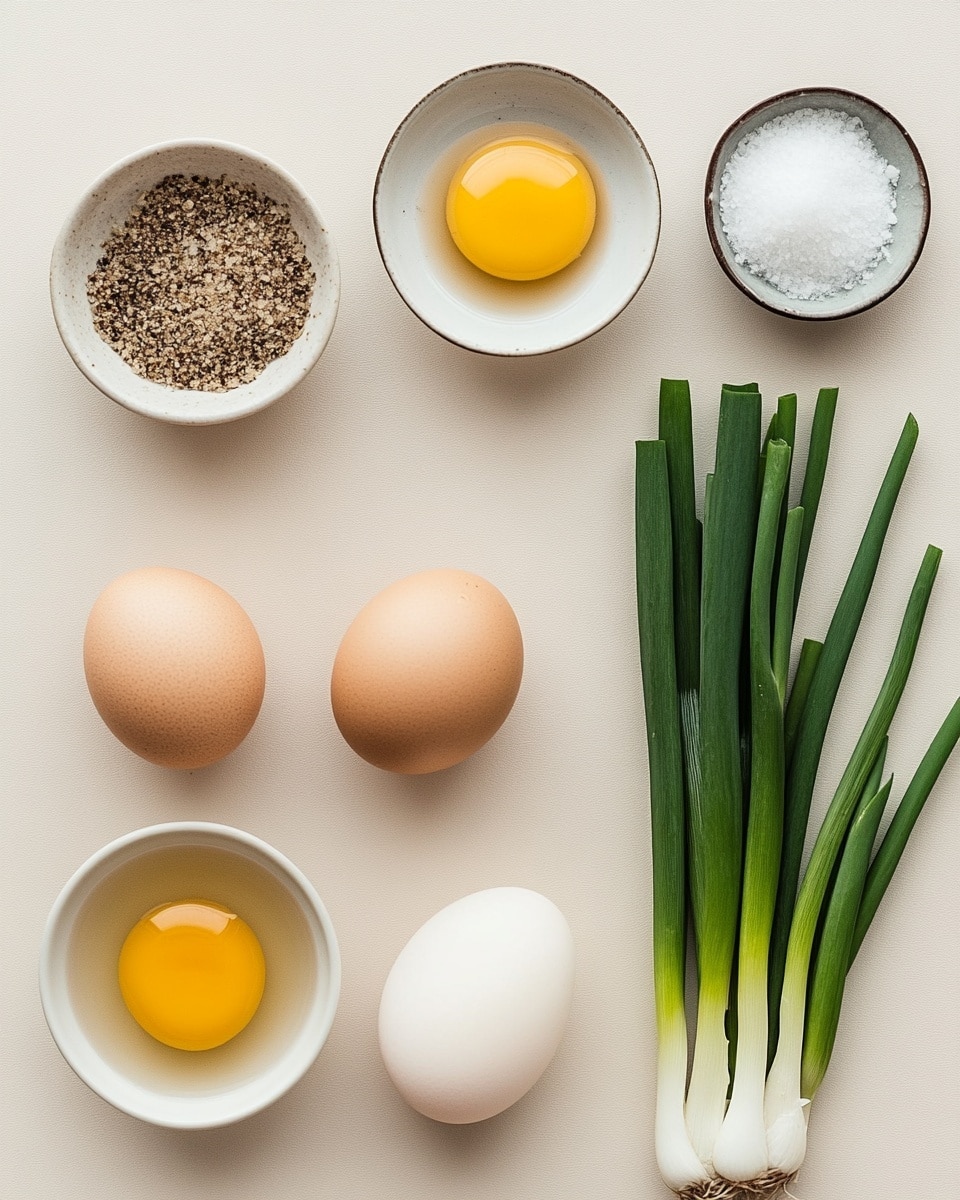 A white bowl filled with light brown broth containing soft, yellow egg ribbons swirling through the soup, topped with bright green chopped scallions scattered in the center. The bowl is on a white cloth with a black geometric pattern, and a white ceramic spoon lies nearby on the cloth. A green scallion stalk rests beside the bowl on a white marbled surface. The photo taken with an iphone --ar 4:5 --v 7