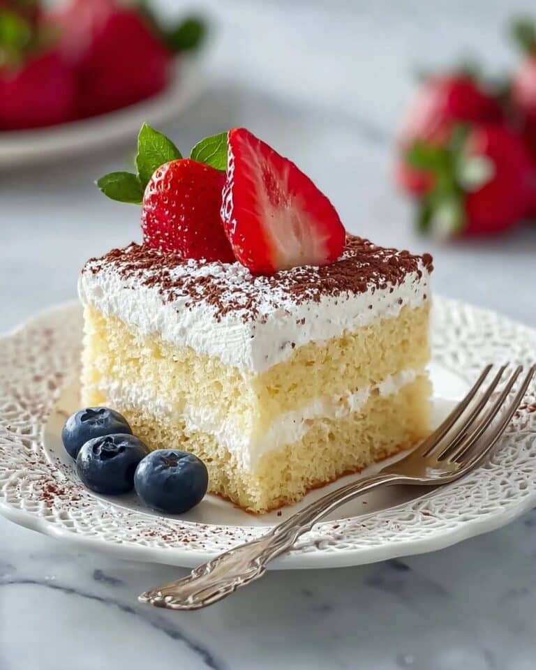 Tres Leches Cake with Rum Milk Sauce and Berry Topping Recipe