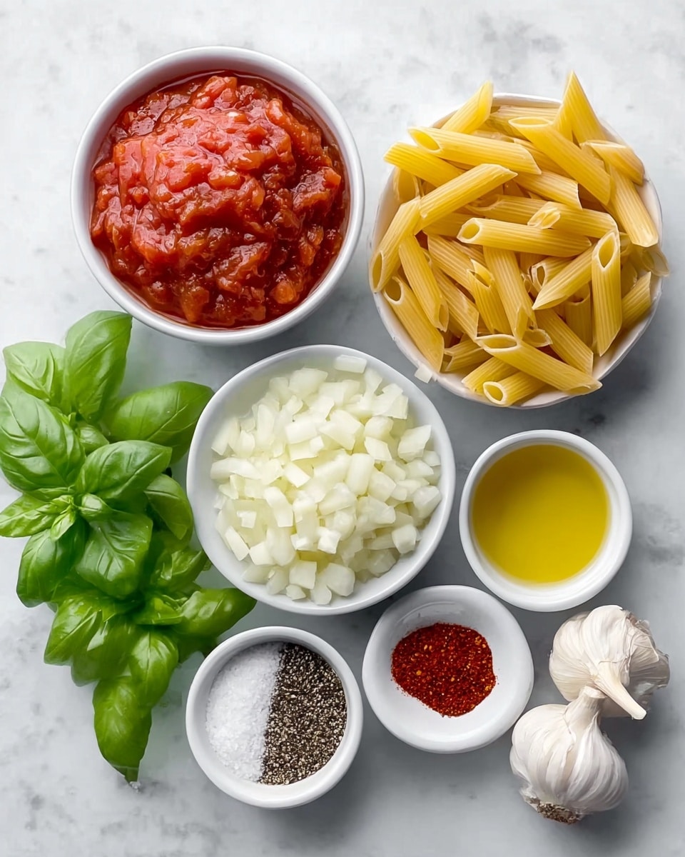 The image shows seven food items arranged neatly on a white marbled surface. There is a pile of dry, yellow penne pasta on the top right. Below it, a small white bowl holds light yellow oil. To the left, another white bowl contains finely chopped white onions. Above that, one more white bowl is filled with red tomato sauce with chunks. Near the bottom, fresh green basil leaves are placed next to a white bowl of white salt crystals. There is also a white bowl with a mix of black pepper and red chili powder. Two whole garlic bulbs are placed, one at the bottom right and the other to the left of the onions. photo taken with an iphone --ar 4:5 --v 7