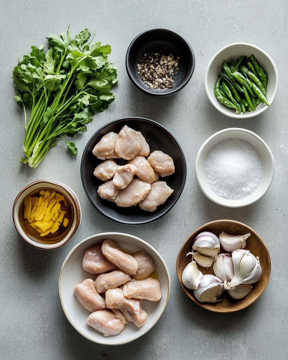 A silver pan filled with many pieces of golden-brown cooked chicken coated in a shiny dark sauce, mixed with bright green sliced jalapeños and thin rings of fresh green onions scattered on top. The pan is on a white marbled surface with a whole golden onion placed nearby, a wooden spoon and cream-colored cloth on the upper left, and a small white cup filled with dark sauce in the upper right. Photo taken with an iphone --ar 4:5 --v 7