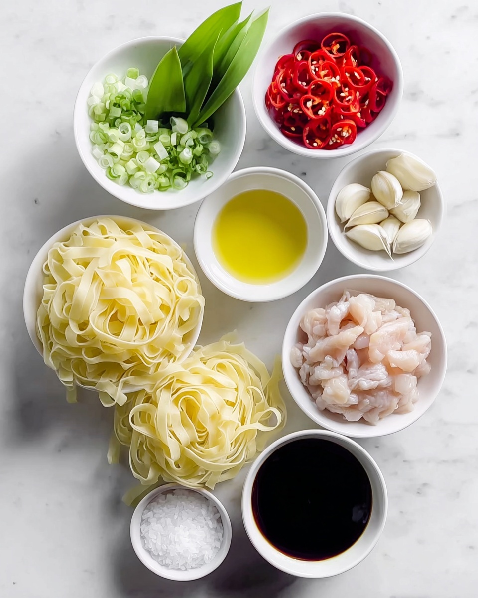 A close-up view of a black wok filled with stir-fried wide flat noodles that are glossy brown from sauce, mixed with pieces of cooked meat and dark green leafy vegetables scattered throughout. Thin slices of red chili peppers add bright color spots on top and within the noodle layers. A wooden spatula rests in the wok on the right side, its smooth texture contrasting with the noodles. The wok is placed on a white marbled surface with fresh green leaves and red chili peppers around it in the background. photo taken with an iphone --ar 4:5 --v 7
