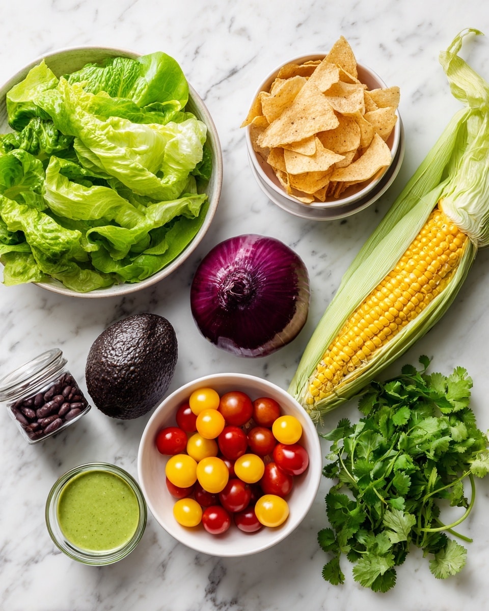 The image shows fresh ingredients arranged on a white marbled surface including a whole dark green avocado, a whole red onion, a small bunch of green cilantro with leaves, and a fresh ear of corn in its husk. There is a white bowl filled with chopped green lettuce, another white bowl with a mix of small red and yellow cherry tomatoes, and a small white bowl containing light brown crispy chips. A can of black beans is also present, along with a small clear container holding a light green creamy dressing. photo taken with an iphone --ar 4:5 --v 7